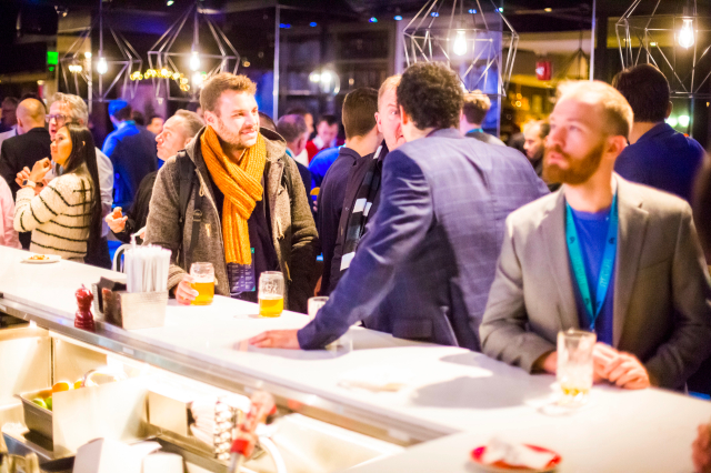 Recur attendees at the bar, talking subscription economics